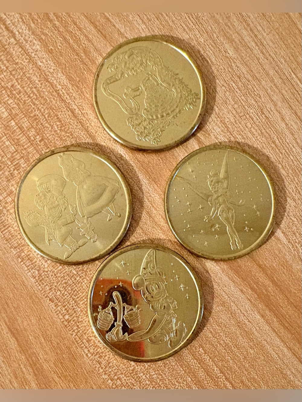 Disney Parks Disneyland Hotel Medallion 4 Coin Set Sorcerer Mickey Tinker Bell